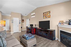 409 Stockton Ridge Cranberry Township, PA 16066 - Photo 4 of 19 a living room with furniture and a flat screen tv