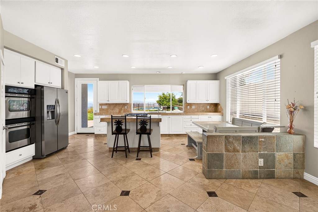 16318 Sun Summit Drive Riverside, CA 92503 - Photo 17 of 47 Open concept kitchen to family room 16318 sun summit drive, riverside, california 92503
