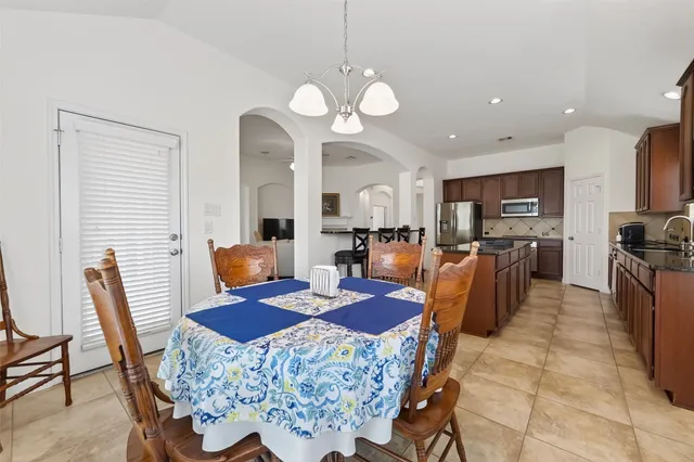 a view of a dining room with furniture