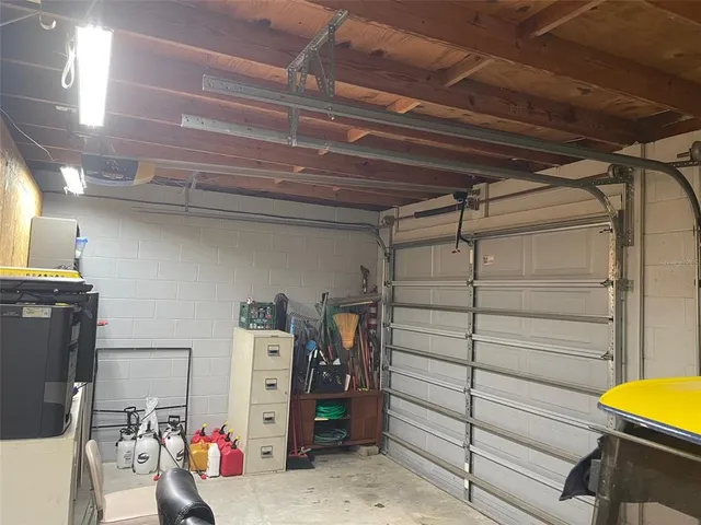 a bedroom with a bed and a mirror