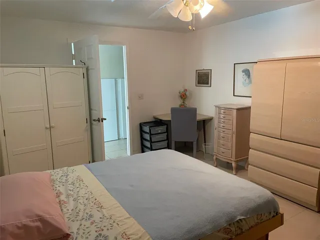 a view of a yard with large trees