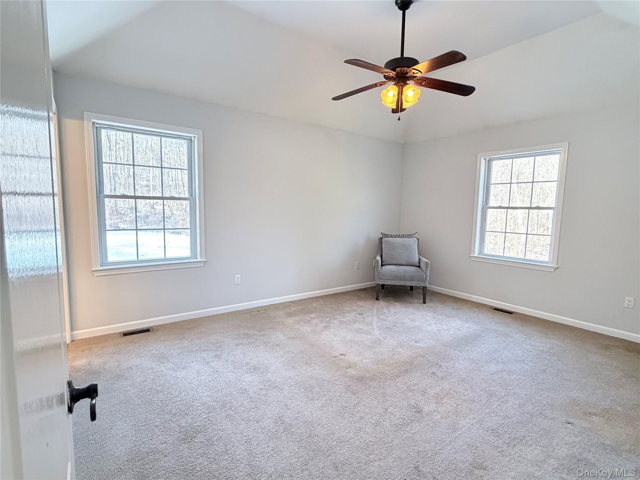 750 Mullock Road Port Jervis, NY 12771 - Photo 12 of 41 an empty room with windows and fan