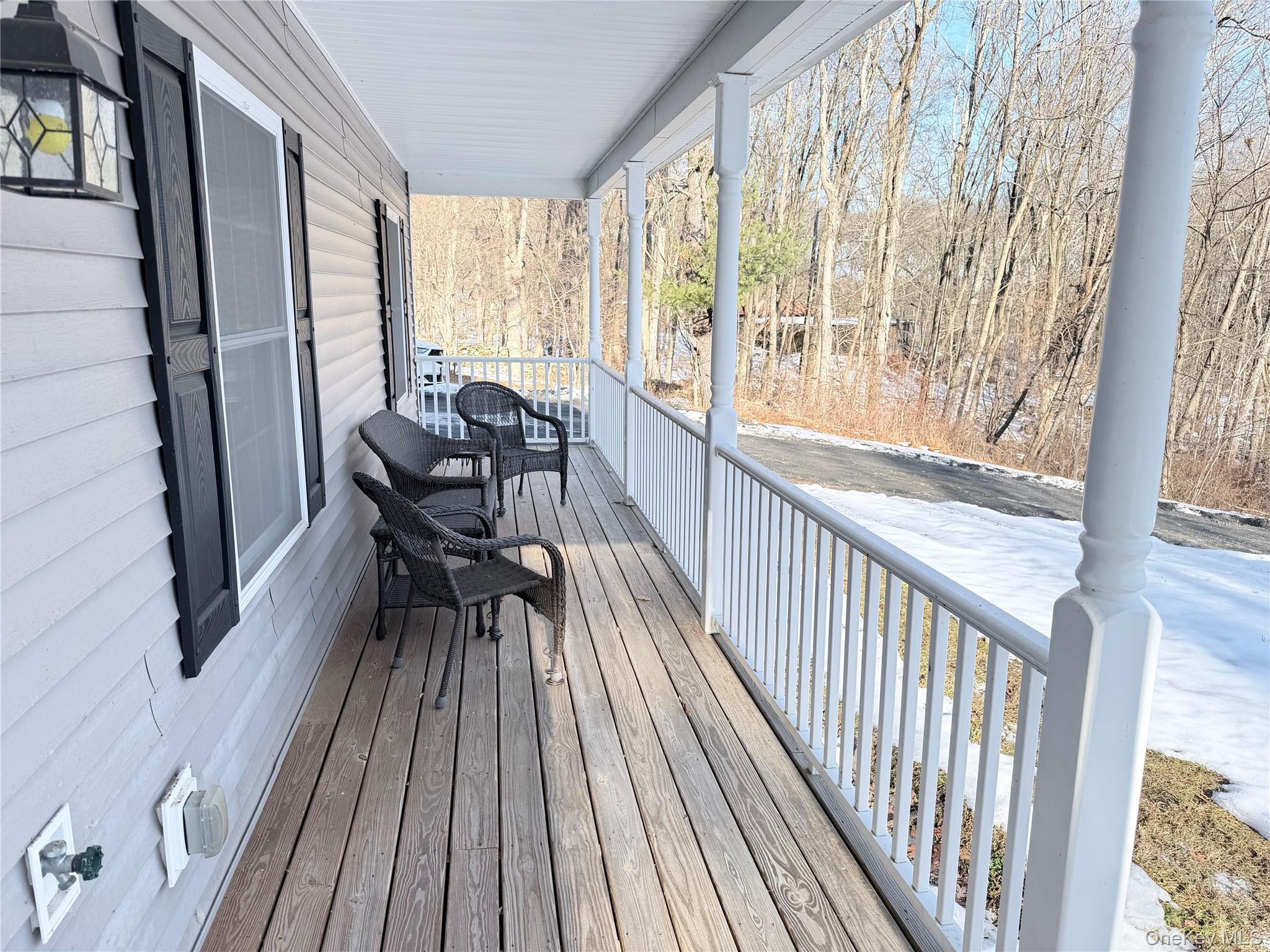 750 Mullock Road Port Jervis, NY 12771 - Photo 33 of 41 a view of a living room with furniture and wooden floor