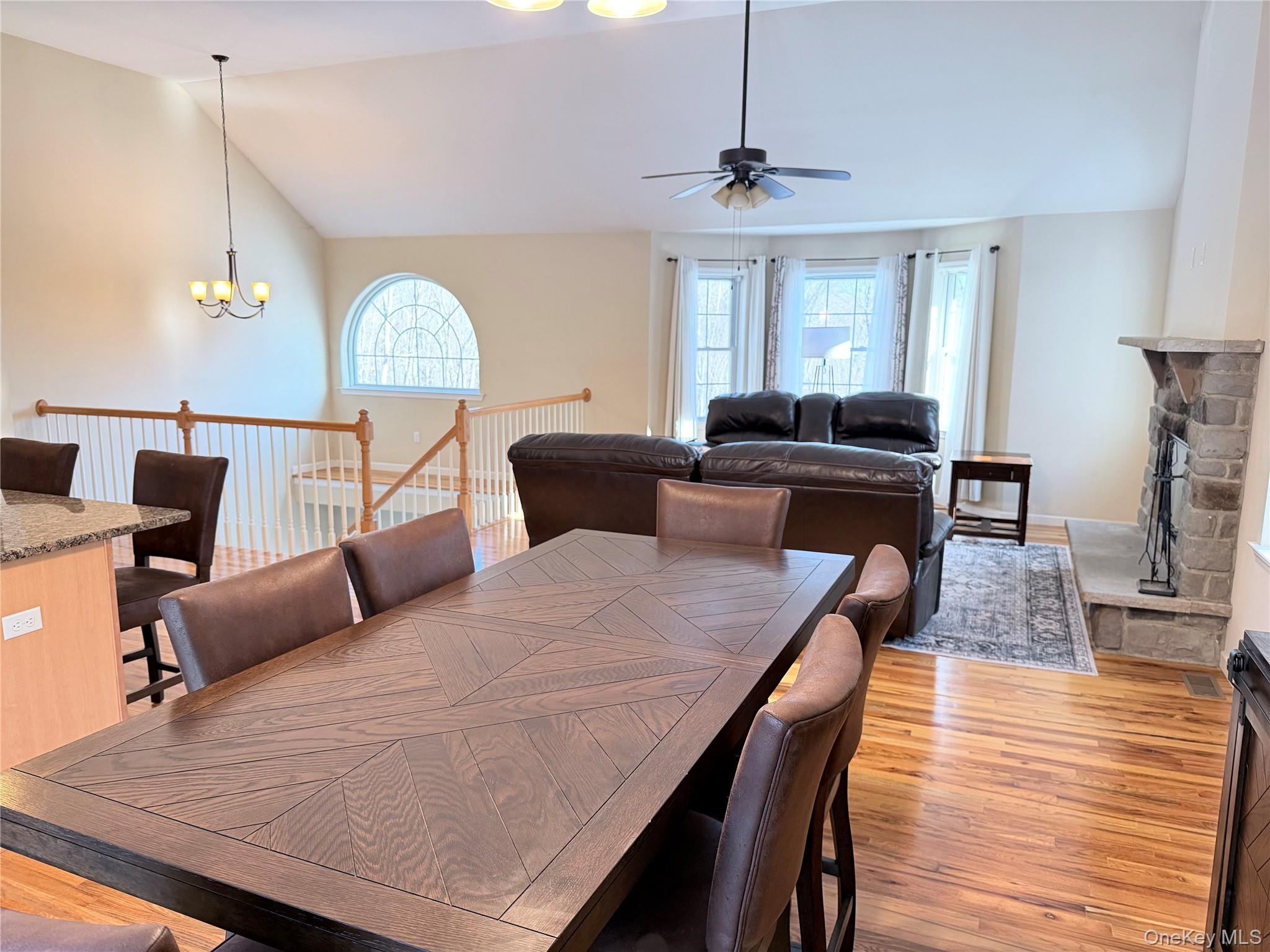 750 Mullock Road Port Jervis, NY 12771 - Photo 5 of 41 a living room with furniture fireplace and a table
