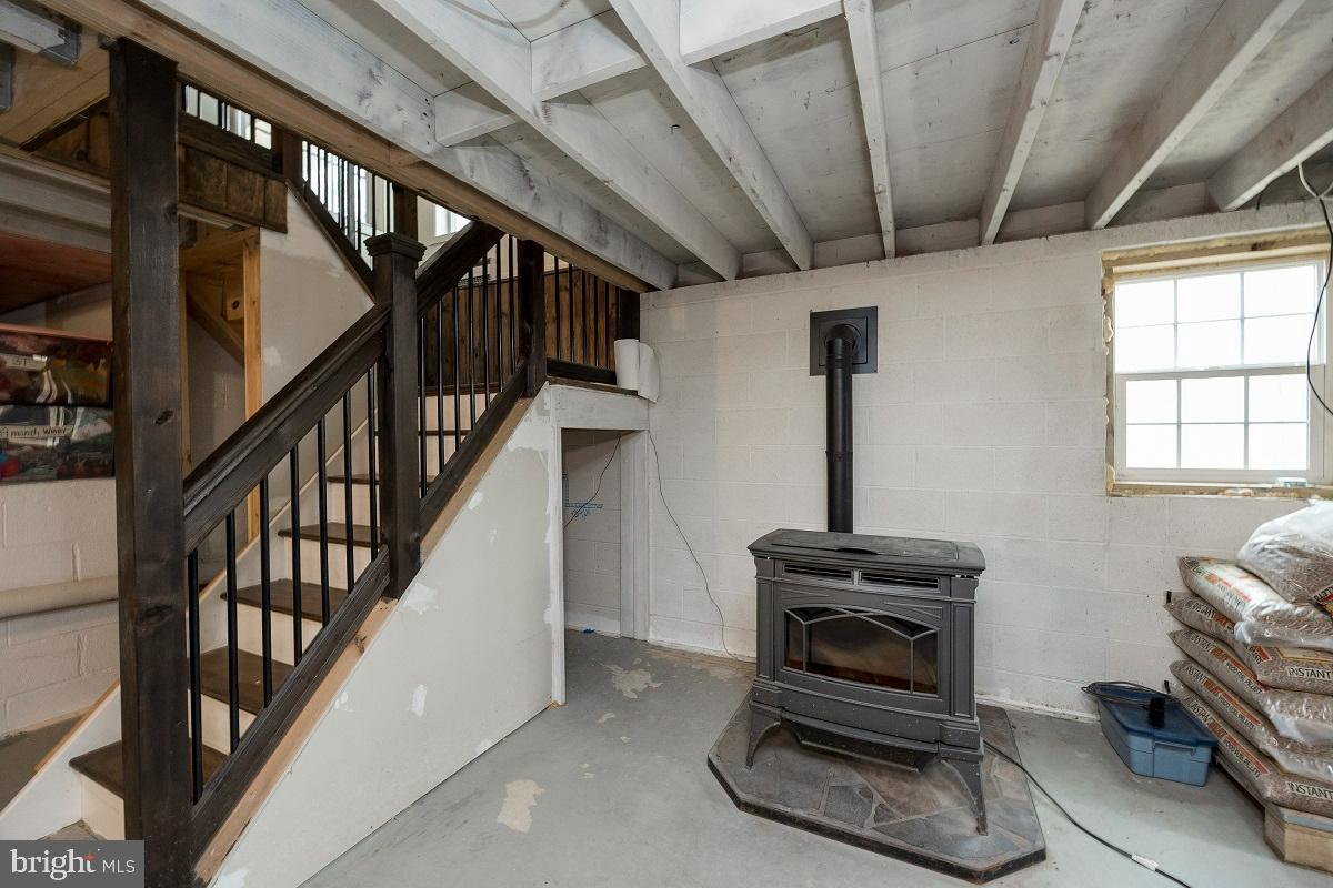 622 Kulp Road Perkiomenville, PA 18074 - Photo 23 of 46 basement pellet stove