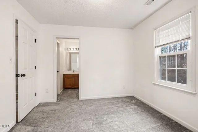 a bathroom with a sink a mirror and a bathtub