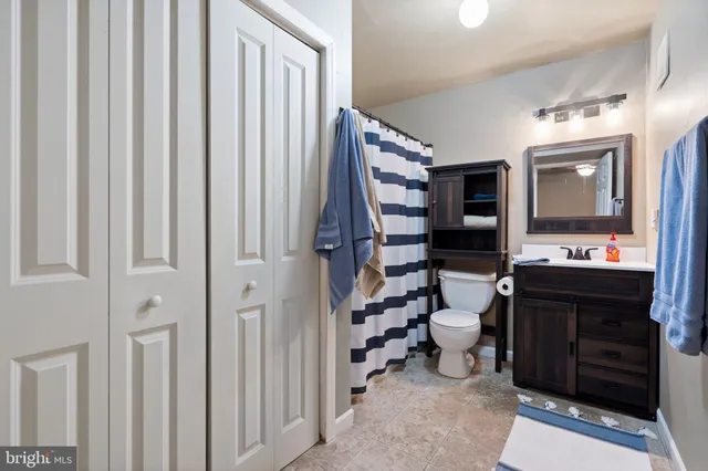 a view of a two chairs in the balcony