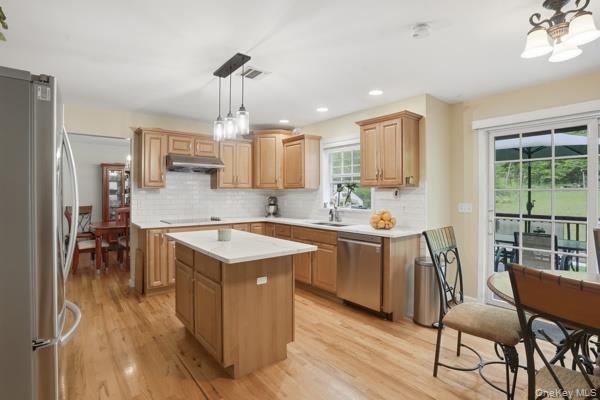 29 Hickory Hill Road Newburgh, NY 12550 - Photo 16 of 47 a kitchen that has a lot of cabinets in it and wooden floor