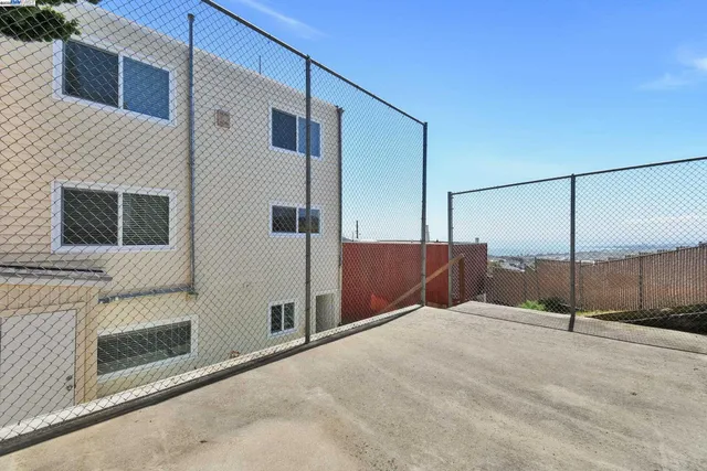a view of a road from front of a house