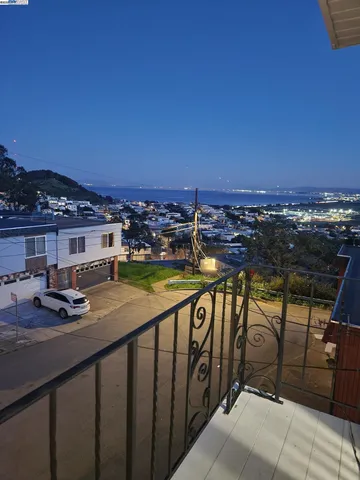 a view of a swimming pool with a lounge chairs