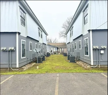 a view of swimming pool with outdoor seating