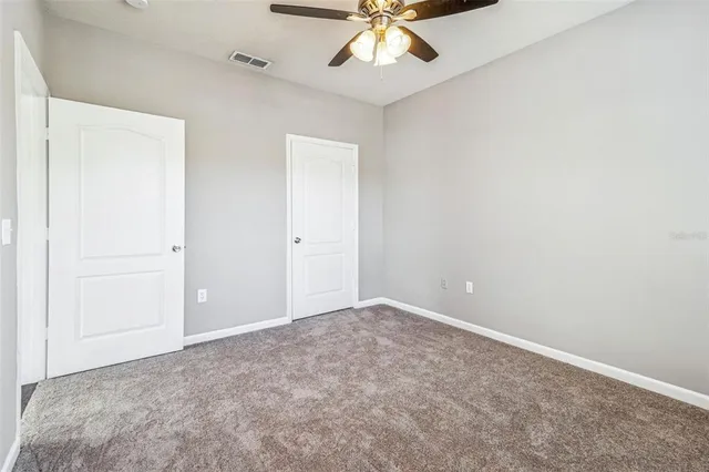 a view of a room with racks on the wall