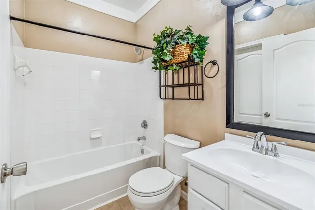 a kitchen with a sink and a stove top oven