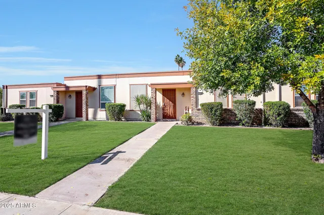 a front view of house with yard