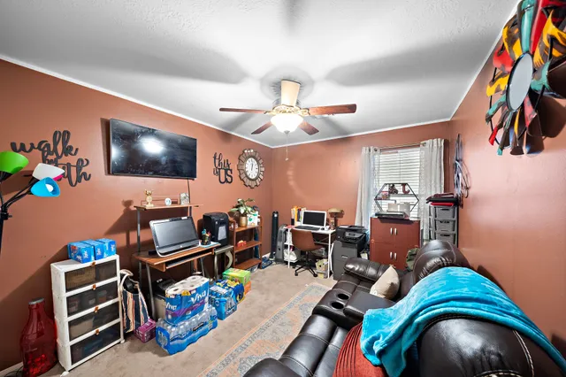 a room with furniture and workspace