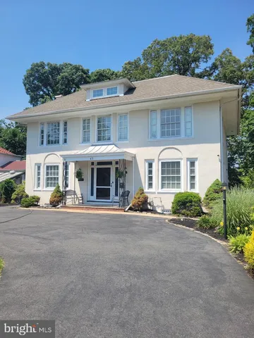front view of a house with a patio