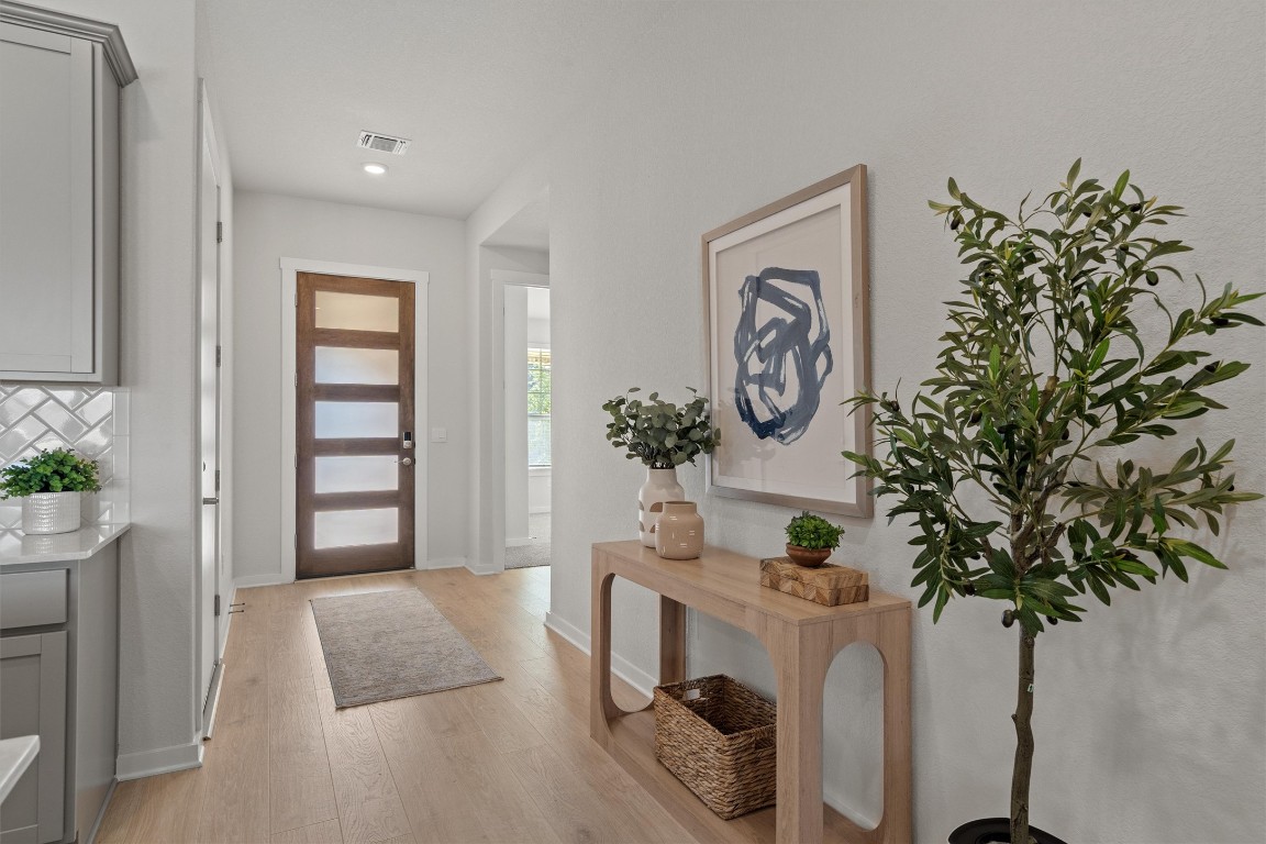 416 Deerpath Street Leander, TX 78641 - Photo 2 of 32 8 foot glass/wood door and long foyer