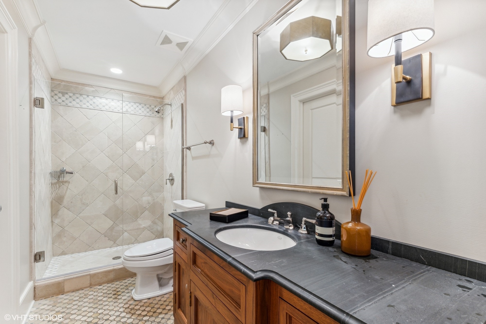 511 Cambridge Lane Lake Bluff, IL 60044 - Photo 14 of 58 a bathroom with a sink a toilet and shower