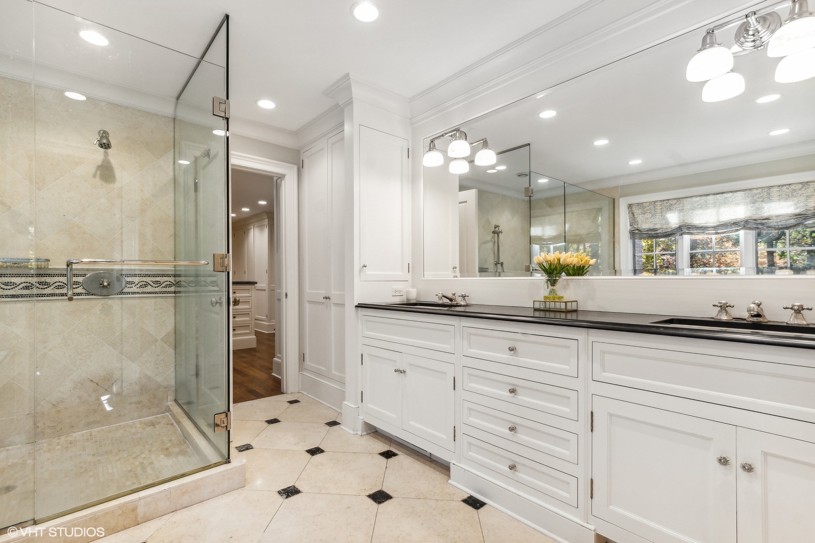 511 Cambridge Lane Lake Bluff, IL 60044 - Photo 33 of 58 a large bathroom with a glass shower door and a sink
