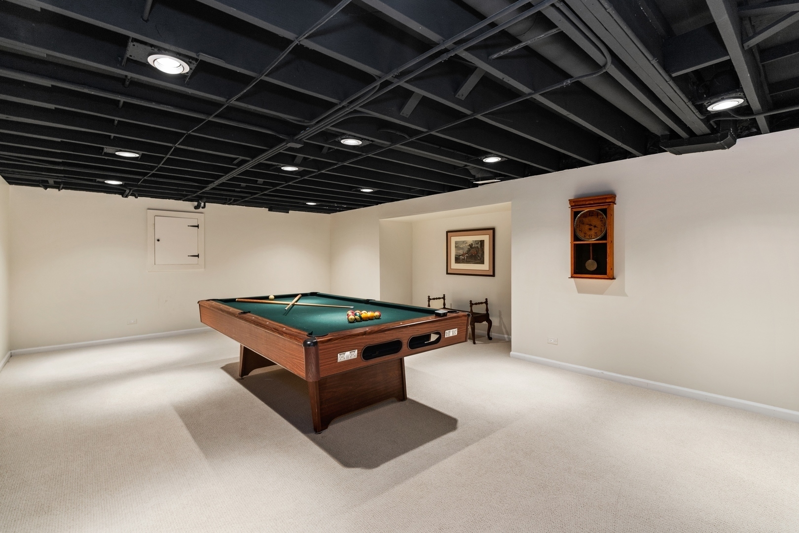 511 Cambridge Lane Lake Bluff, IL 60044 - Photo 42 of 58 a room with pool table and a hallway