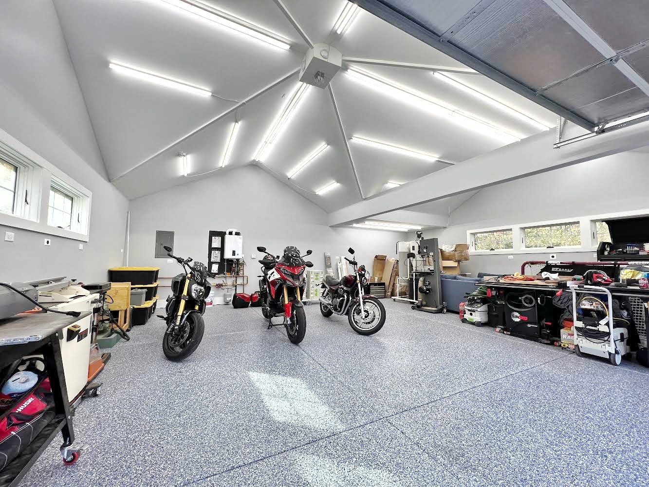 511 Cambridge Lane Lake Bluff, IL 60044 - Photo 52 of 58 a view of a garage with a bike and car