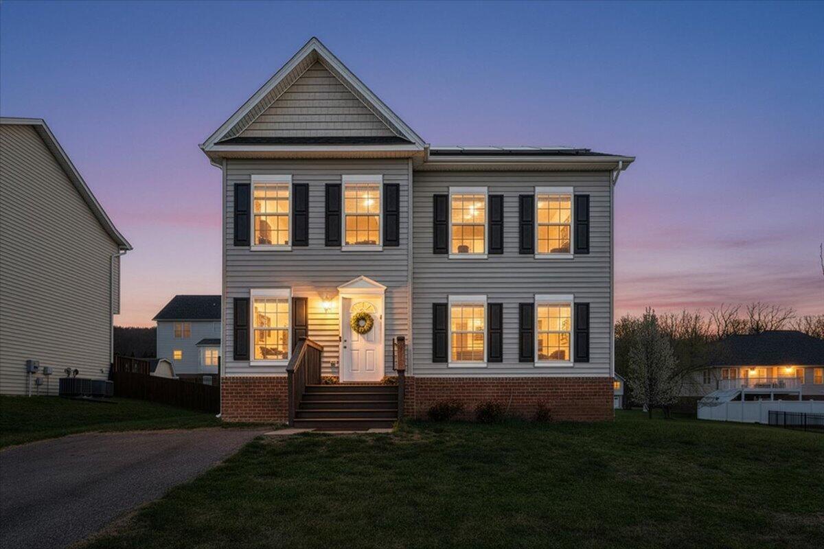 427 Cambridge Ct Road Vinton, VA 24179 - Photo 2 of 46 a front view of a house with a yard