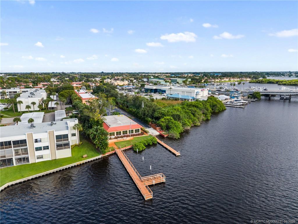 1955 Southwest Palm City Road, Unit I Stuart, FL 34994 - Photo 34 of 41 Day dock and fishing pier on the river