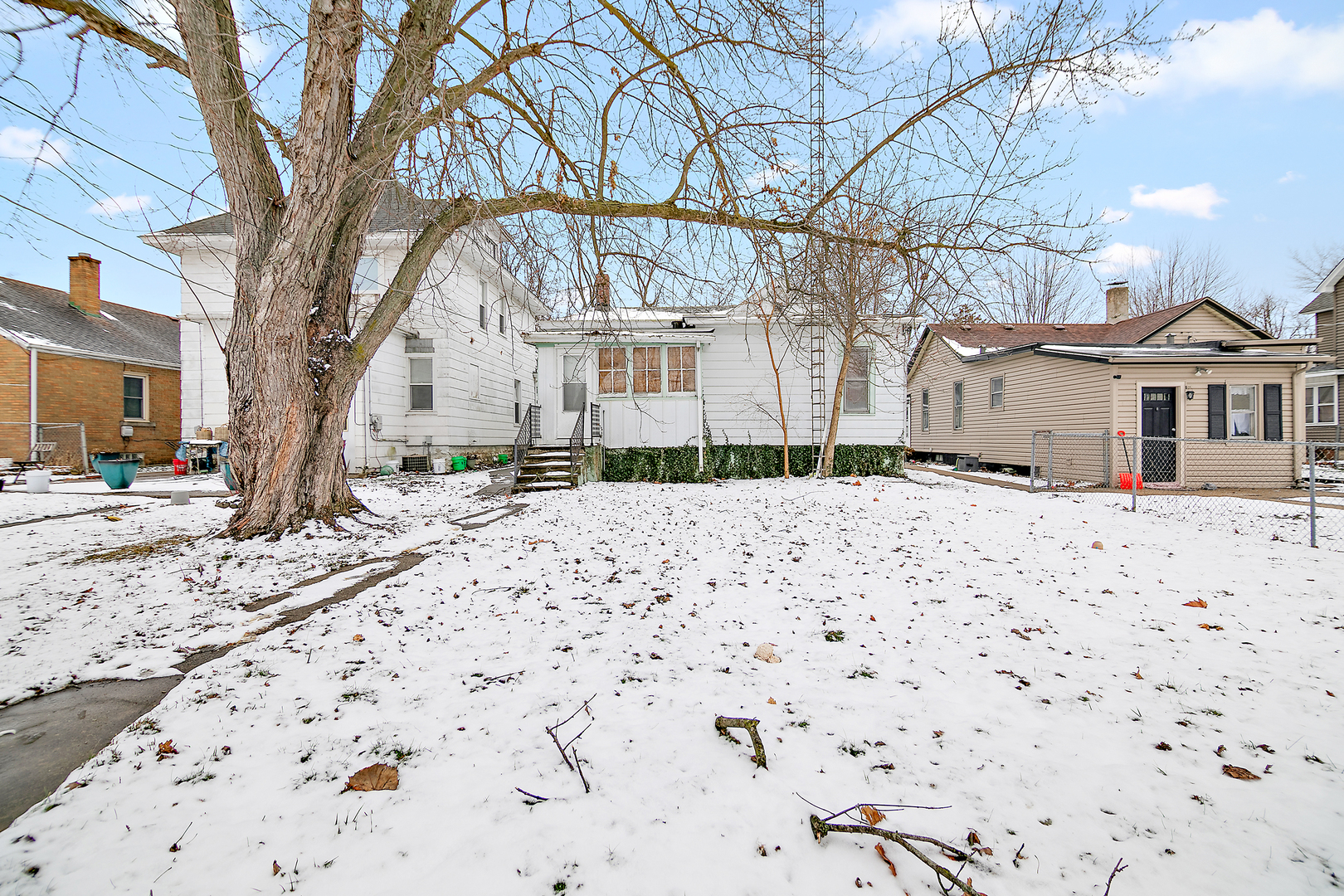 974 South Washington Avenue Kankakee, IL 60901 - Photo 14 of 14 a view of house with snow on the road