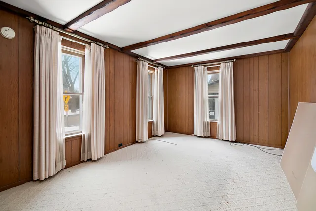 an empty room with windows