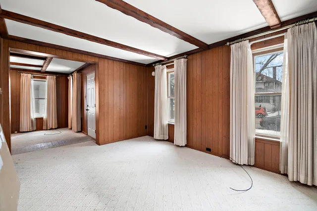 a view of a hallway with a chandelier