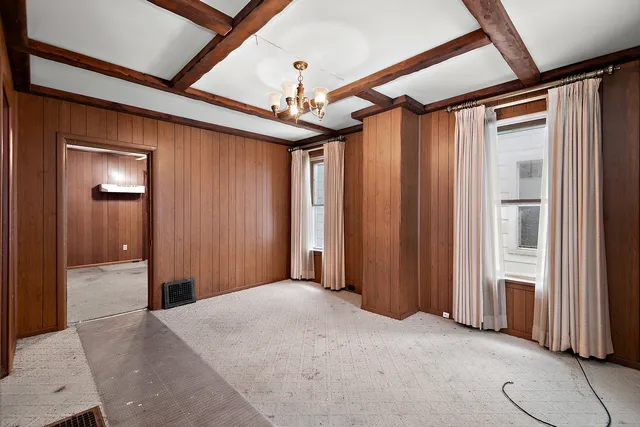 a kitchen with stainless steel appliances granite countertop a sink a stove and cabinets