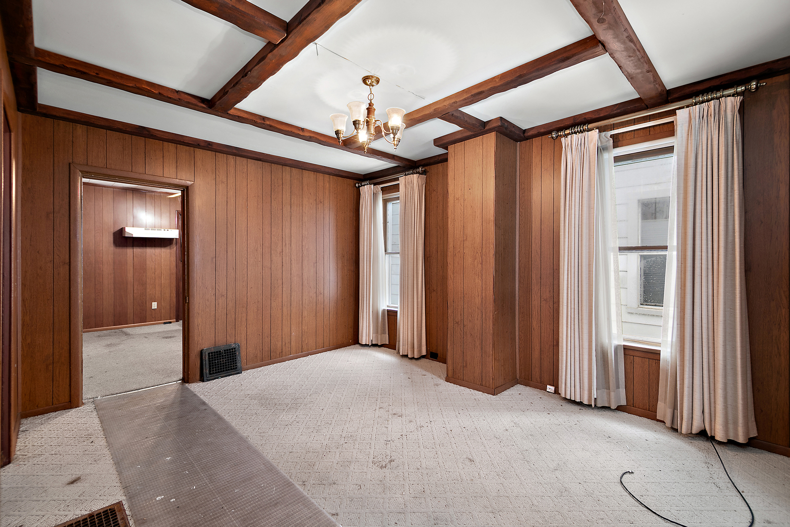 974 South Washington Avenue Kankakee, IL 60901 - Photo 5 of 14 a view of a hallway with a chandelier