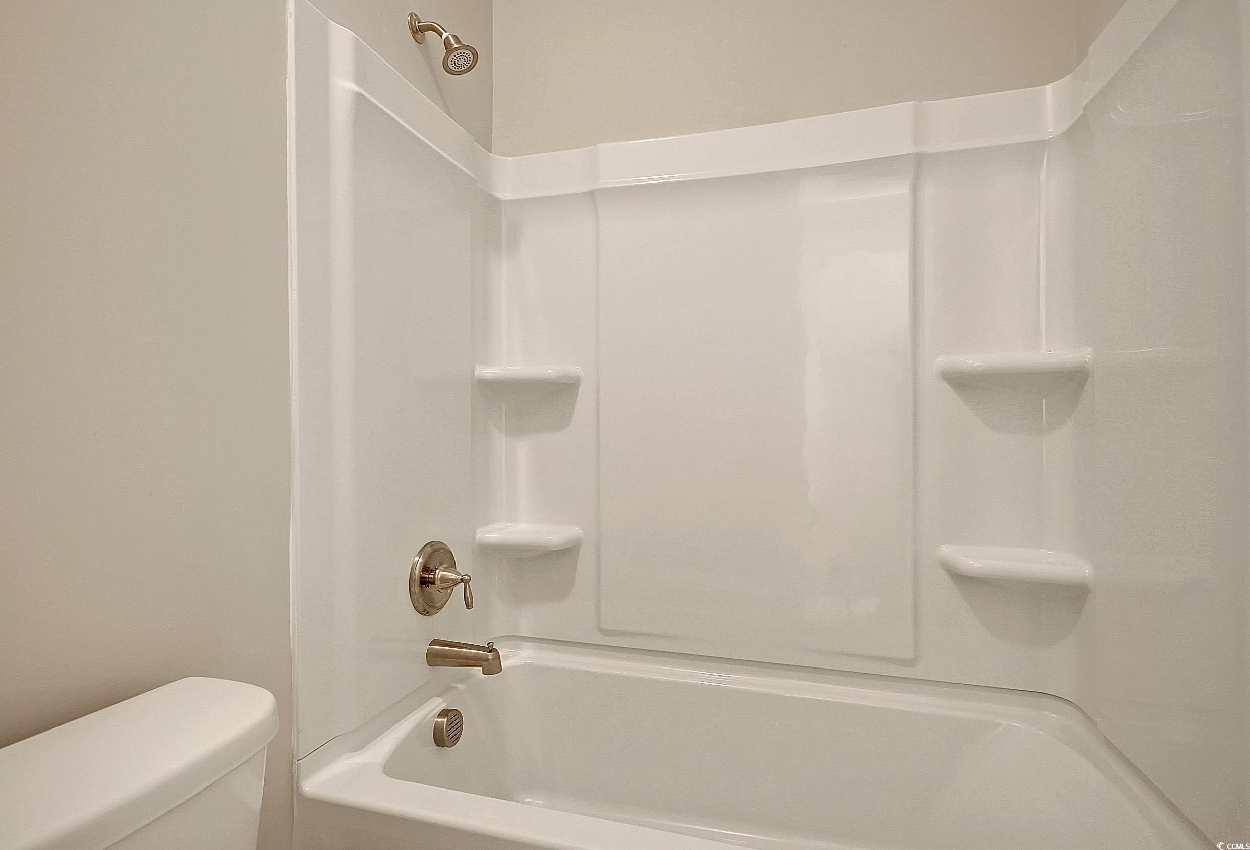 171 Pinebury Drive Georgetown, SC 29440 - Photo 13 of 30 Bathroom with tub / shower combination and toilet