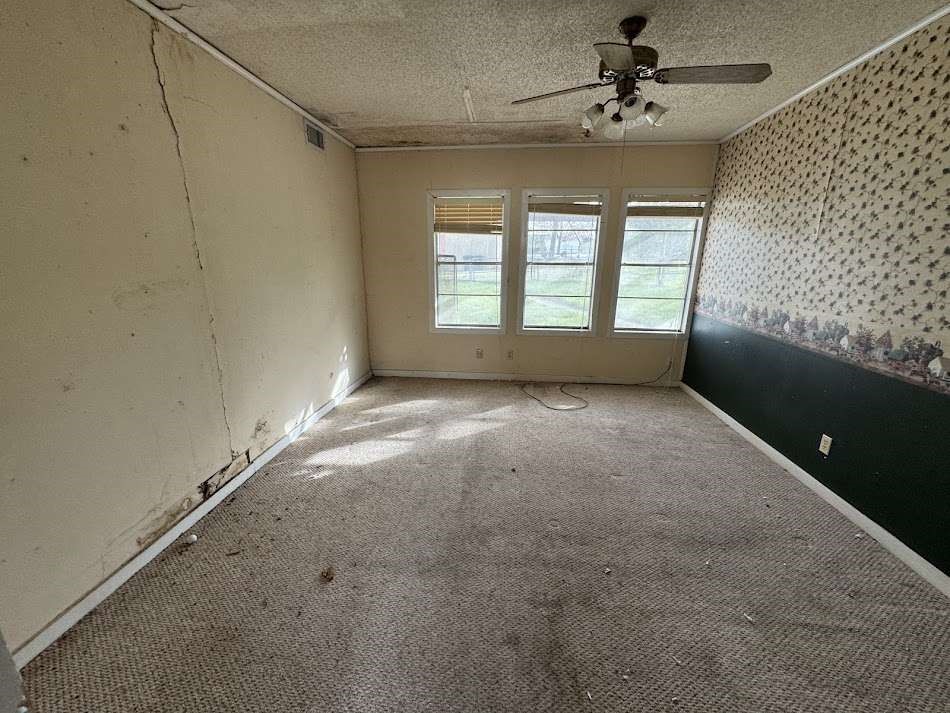 1302 South 23rd Street Temple, TX 76504 - Photo 7 of 11 a view of an empty room with a window