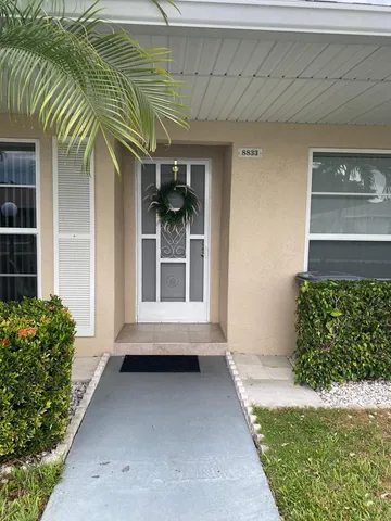 a view of backyard with green space
