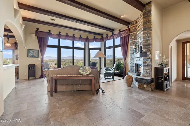 a dining room with furniture and window