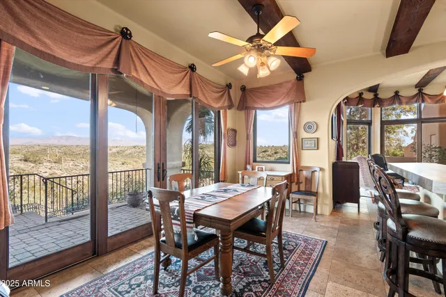 a spacious bedroom with a bed and a window