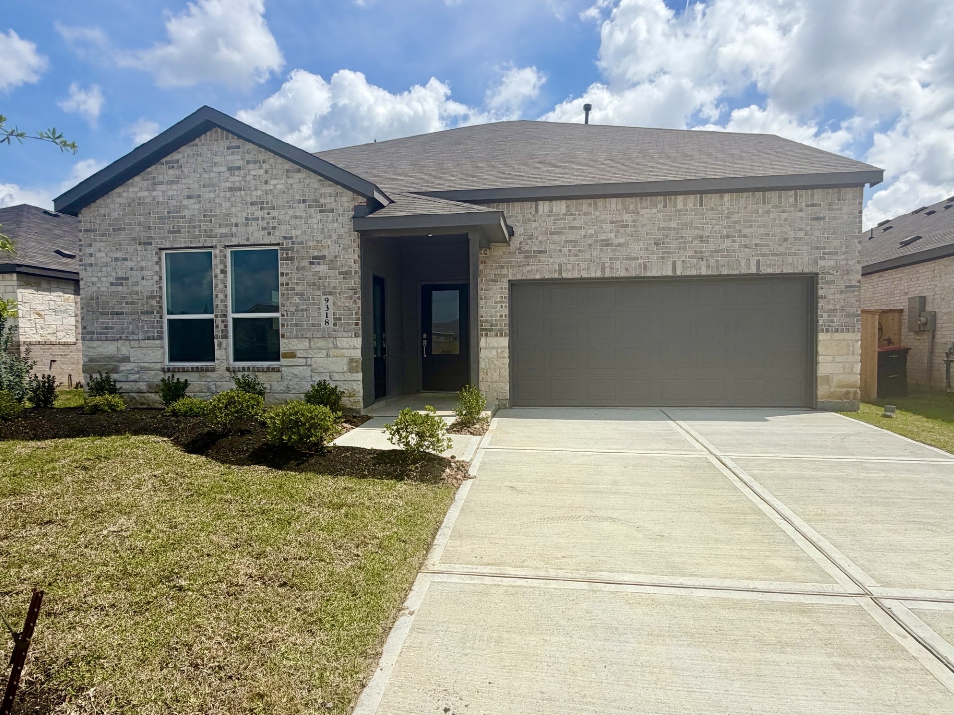9318 Long Fin Drive Baytown, TX 77521 - Photo 1 of 23 a front view of a house with yard