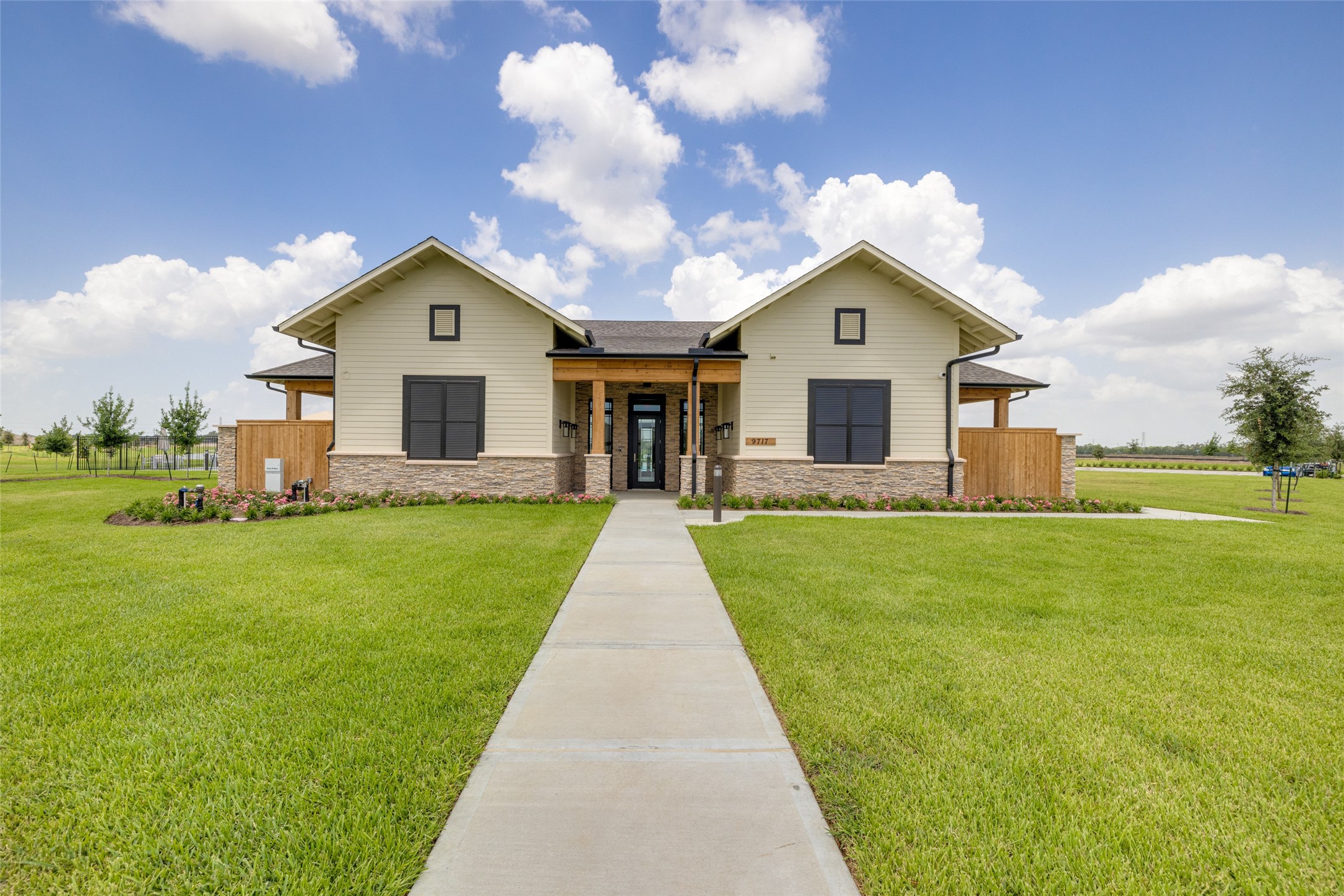 9318 Long Fin Drive Baytown, TX 77521 - Photo 19 of 23 a front view of a house with garden