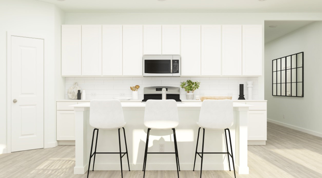 9318 Long Fin Drive Baytown, TX 77521 - Photo 2 of 23 a white kitchen with a stove a sink and white cabinets