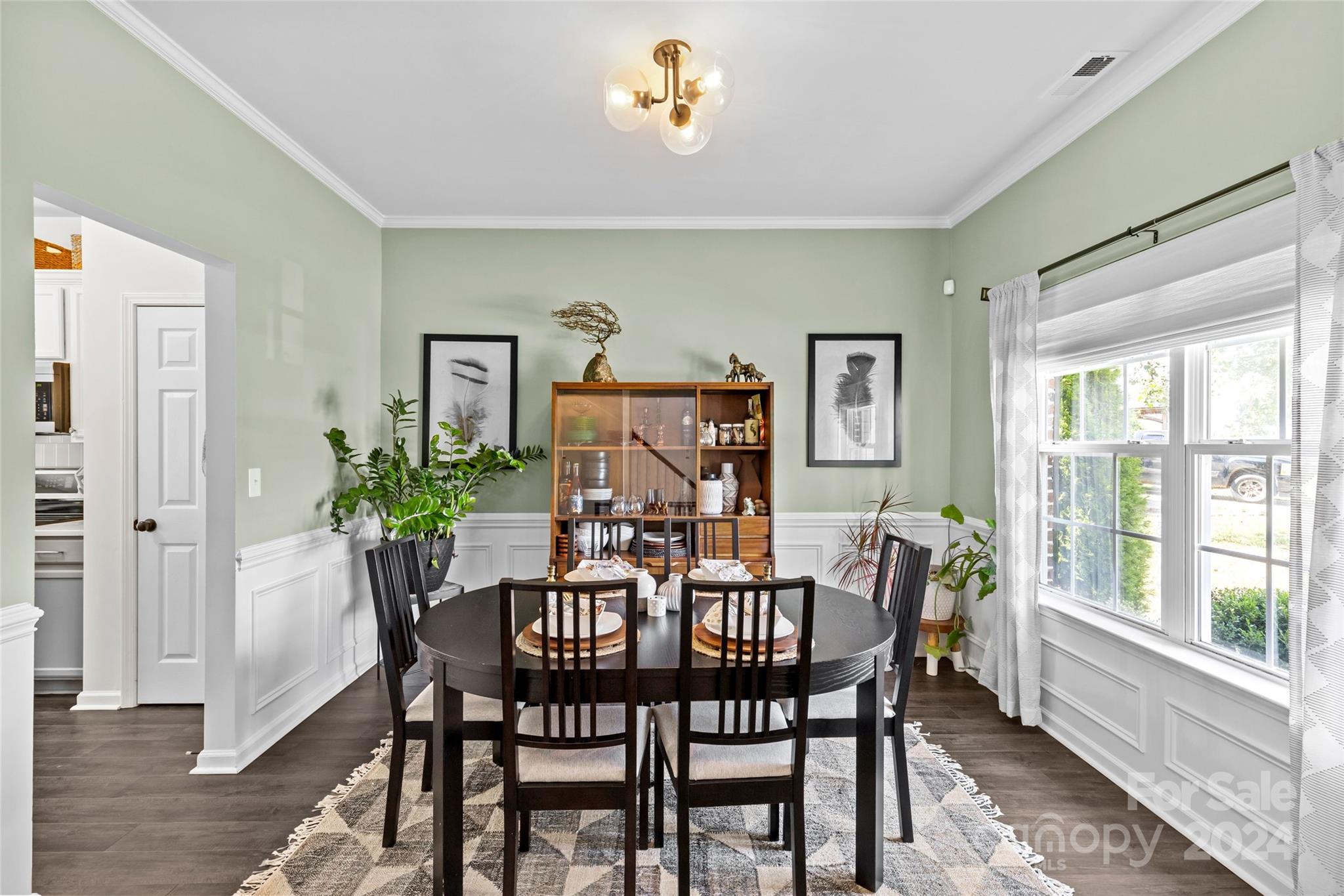 11524 Chapeclane Road Charlotte, NC 28278 - Photo 4 of 42 a view of a dining room with furniture window and wooden floor