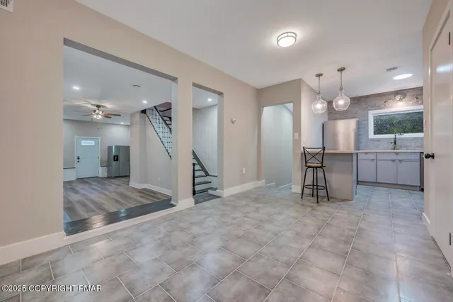 a kitchen with a stove and a sink