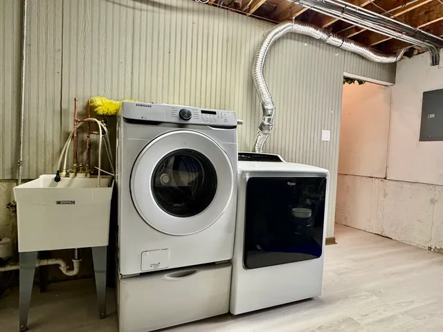 a utility room with dryer and washer