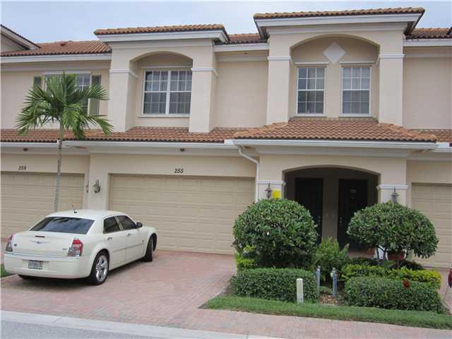 255 Southwest Walking Path Stuart, FL 34997 - Photo 1 of 16 a front view of a house