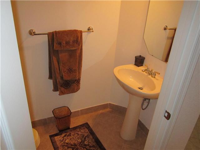 255 Southwest Walking Path Stuart, FL 34997 - Photo 13 of 16 a bathroom with a sink and a mirror