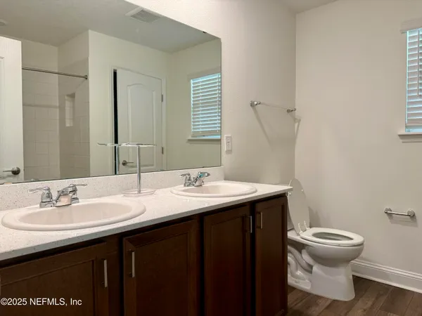a bathroom with a sink and a toilet