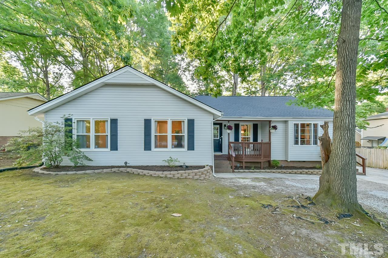 7204 Ray Road Raleigh, NC 27613 - Photo 1 of 40 a house that has a tree in front of it