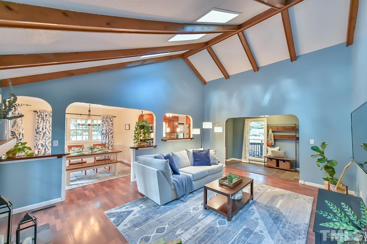 7204 Ray Road Raleigh, NC 27613 - Photo 20 of 40 a living room with furniture and a flat screen tv