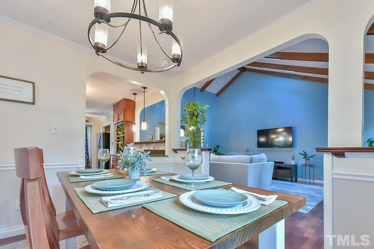7204 Ray Road Raleigh, NC 27613 - Photo 22 of 40 a view of a dining room with furniture