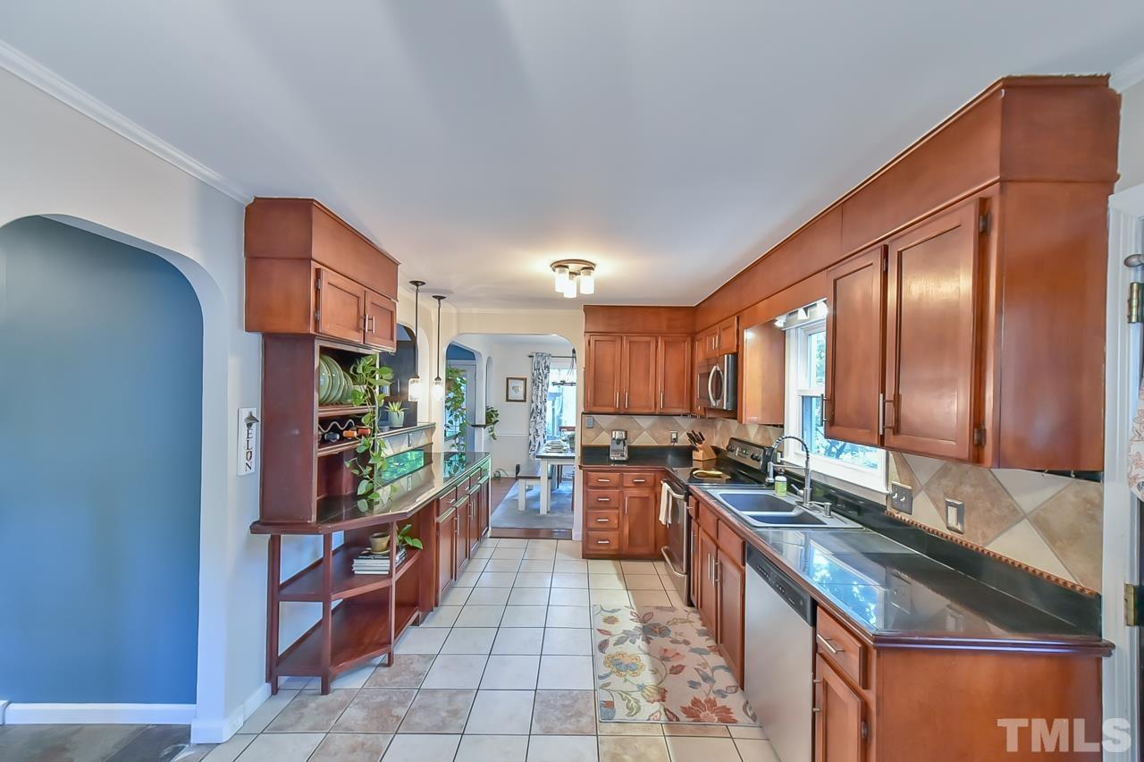 7204 Ray Road Raleigh, NC 27613 - Photo 24 of 40 a kitchen with lots of counter top space